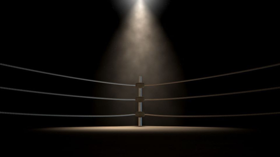 Corner of a boxing right with a single spotlight