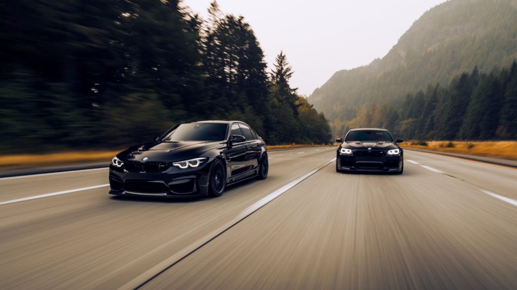 Supercars speeding on the highway