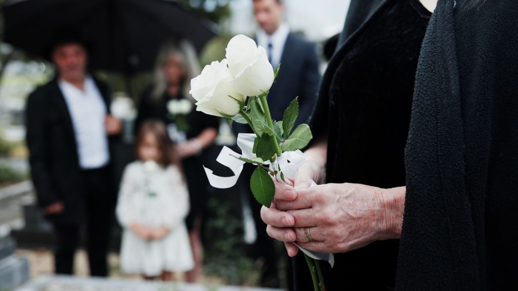 Grieving family at a funeral